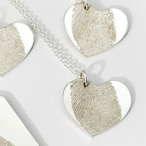 Engraved fingerprint heart pendant on chain | Adriana McNeely Designer & Goldsmith
