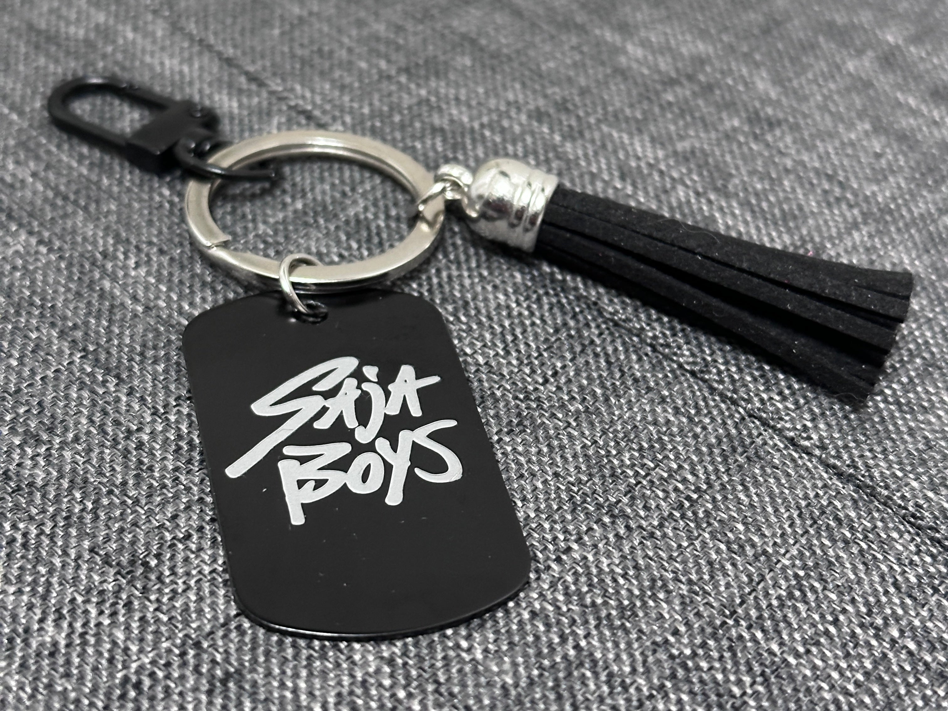 K-Pop Demon Hunters Bag Charm – Saja Boys vs HUNTR/X (Black Stainless Steel)