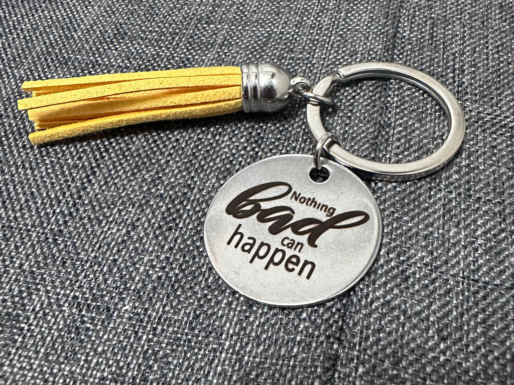 “Nothing Bad / Only Good” Bag Charm – Stainless Steel with Tassel