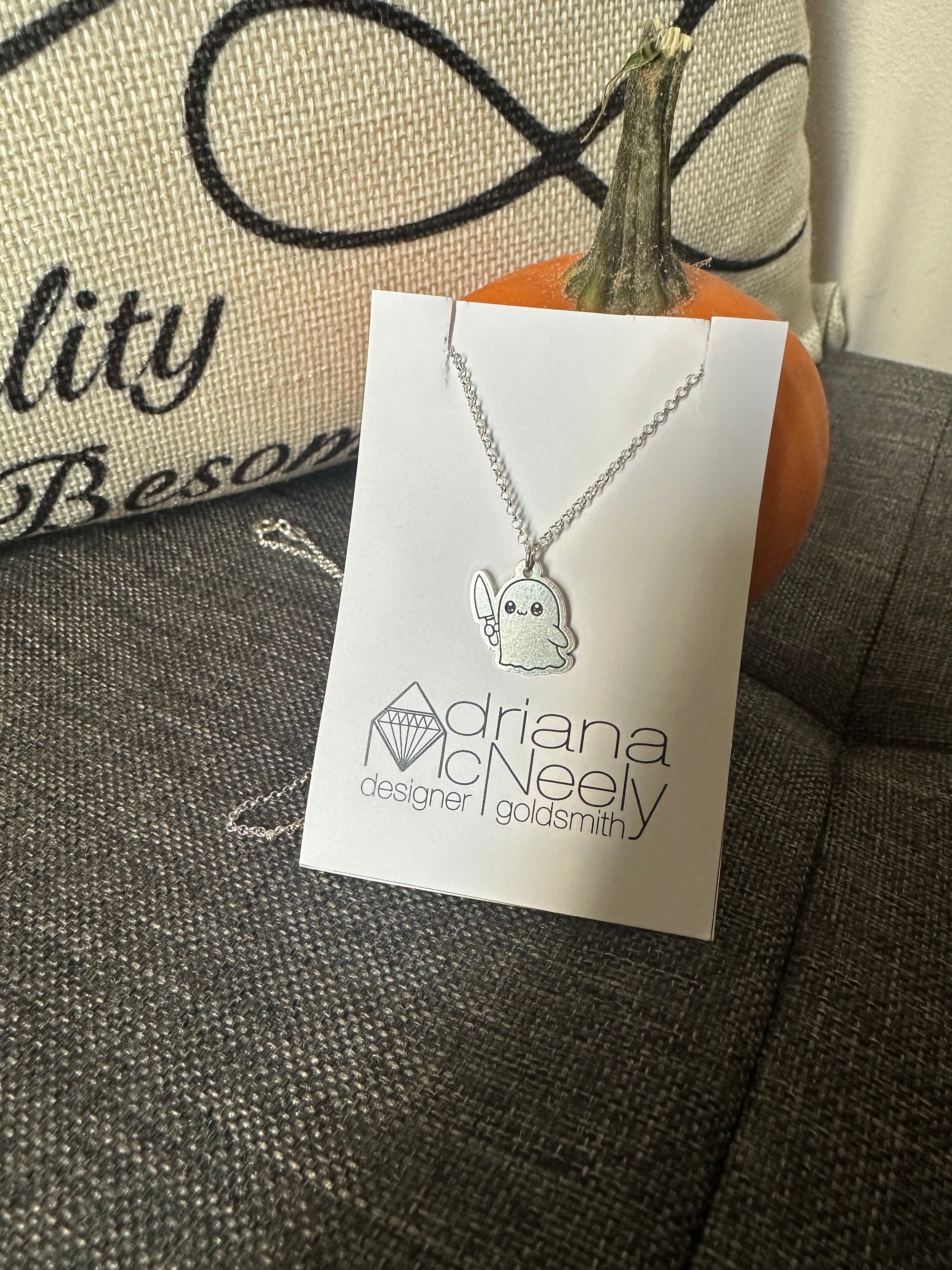 Ghost with knife pendant
