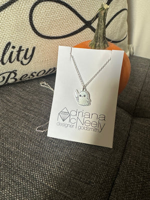 Ghost with knife pendant